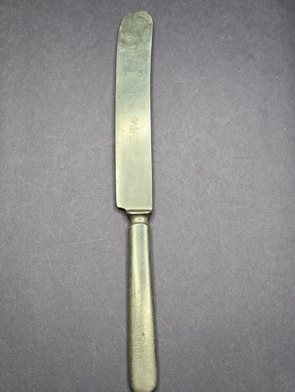 Stainless Butter Knife with Embossed Maker's Mark - Silver Tone